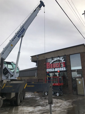 Crane Lifting Business Sign